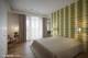
                                    房间呼应设计主轴，以自然、清爽的用色计划串联木质语汇，展现舒适温和的场域调性。