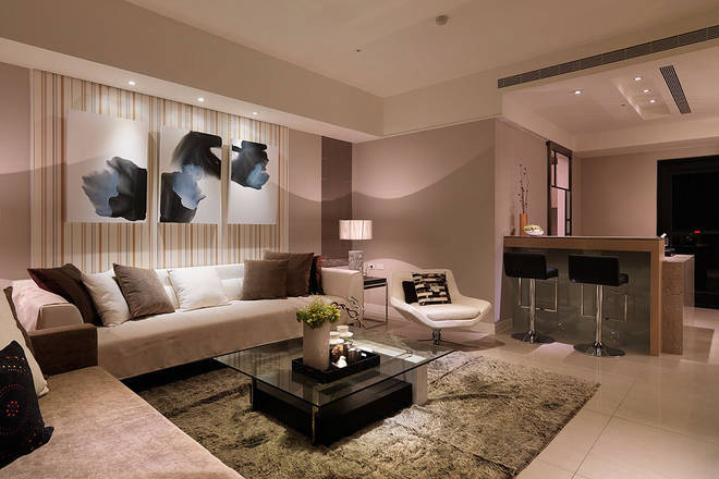 现代 简约 沙发 壁纸 客厅图片来自tukumajia在180平现代简约四居的分享