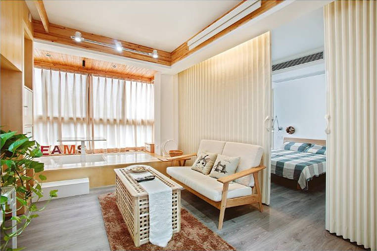 客厅图片来自tukumajia在70平日式原木两居的分享