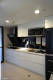 
                                    封闭式的厨房空间，经调整后，呈现半开放式的宽裕尺度。