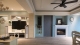 
                                    电视墙上方特别设计一道开口，让室内餐厨区空气得以相互流通。