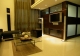 
                                    客厅设计为挑高手法，搭配水泥板壁饰增加空间感；在TV墙左侧设计二块玻璃层板置放视听器材。