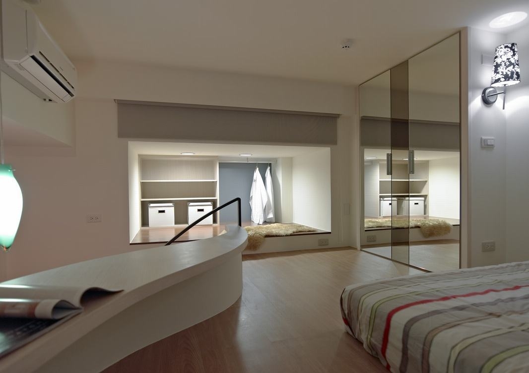二楼卧房图片来自玉鼎设计团队在机能美 圆曲线简约居_现代风_39 平客厅、吧台、卧房、浴室的分享