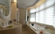 
                                    主卧专属浴室独特的半圆形洗手台面呼应古典雕花圆镜，室内洋溢无限奢华气息。