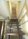
                                    利用楼梯下的空间增加收纳机能，延伸而上的阶梯以通透的设计结构，丰富居家的层次变化。